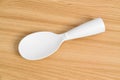 White rice spoon or rice ladle on wooden table Royalty Free Stock Photo