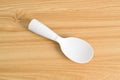 White rice spoon or rice ladle on wooden table Royalty Free Stock Photo