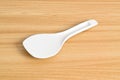 White rice spoon or rice ladle on wooden table Royalty Free Stock Photo