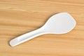 White rice spoon or rice ladle on wooden table Royalty Free Stock Photo