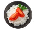 White rice with tomato in black bowl isolated on white background. top view Royalty Free Stock Photo