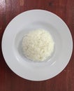 White rice on a white porcelain plate Royalty Free Stock Photo