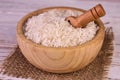 White rice in a wooden bowl.Close-up. Royalty Free Stock Photo