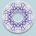 White ring frame with blue openwork pattern on light background with shadow. Paper cut 3d ornamental border. Invitation or Royalty Free Stock Photo