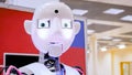 White robot head at robotic show