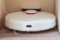 White robot vacuum cleaner. robotic exhauster