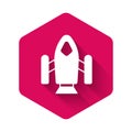White Rocket ship icon isolated with long shadow background. Space travel. Pink hexagon button. Vector Royalty Free Stock Photo