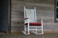 White rocking chair in abandoned cabin in Alabama. Royalty Free Stock Photo
