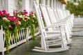 White Rocking Chairs on Long Porch