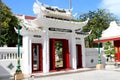 White roof and grate with red door ancient Chinese style. Royalty Free Stock Photo