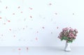 White room background decor with blow pink leaves, branch, rose. 3d render.