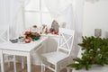 White room interior with christmas decoration, window, table and chair Royalty Free Stock Photo