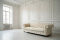 White room with sofa and empty background wall Royalty Free Stock Photo