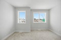 White room with two windows and a white wall Royalty Free Stock Photo