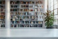 A white room with a wooden table and a shelf full of books