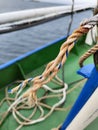 white rope with a binding fiber that binds on the boat 10