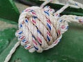 white rope with a binding fiber that binds on the boat 28