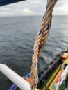 white rope with a binding fiber that binds on the boat 29