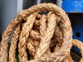 white rope with a binding fiber that binds on the boat 30