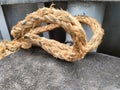 white rope with a binding fiber that binds on the boat 11