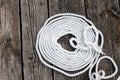 White rope on wooden deck view from above Royalty Free Stock Photo