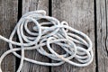 White rope on wooden deck view from above Royalty Free Stock Photo