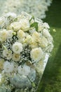 White rose flower bouquets decoration setup on wedding ceremony