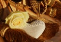 White rose, heart and joyful play of golden hues