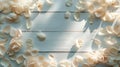 White rose petals scattered on a white surface of wooden planks Royalty Free Stock Photo