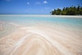 White and rose sand beach with blue lagoon