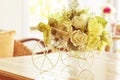 White roses in a bicycle vase Royalty Free Stock Photo