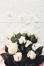 White roses on wooden background, space for text. Floral greeting card mockup. Valentines or happy mother day concept. Bouquet Royalty Free Stock Photo