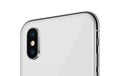 White rotated smartphone similar to iPhone X back side close up with camera module isolated on white background Royalty Free Stock Photo