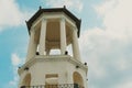 White rotunda against a blue cloudy sky