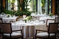 The white round banquet tables in the restaurant. Stylish event decor Royalty Free Stock Photo