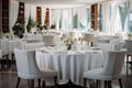 The white round banquet tables in the restaurant. Stylish event decor Royalty Free Stock Photo