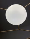 White round ceiling lamp with gold metal frame Royalty Free Stock Photo