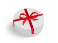 White round cilinder gift box with red bow Royalty Free Stock Photo