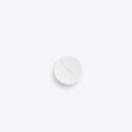 White round medicine tablet. Medicament pill. Pharmaceutical drug.