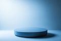 A white round object sits on a blue surface Royalty Free Stock Photo