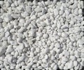 White rounded pebble texture pattern. Royalty Free Stock Photo