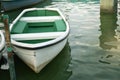 White rowboat moored near shore. - Concept quiet, wait Royalty Free Stock Photo