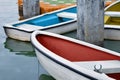 White rowboat moored near shore in the lake Royalty Free Stock Photo