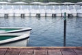 White rowboat moored near shore in the lake Royalty Free Stock Photo