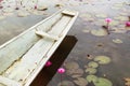 White rowboat in pink lotus pond Royalty Free Stock Photo