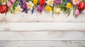 white rustic wooden texture table top view with blossoming spring flowers, with copy space