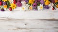 white rustic wooden texture table top view with blossoming spring flowers, with copy space