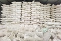 White sack stack in storage room