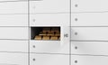 White safe deposit boxes in a bank. There are gold bullions inside of a one box. A concept of storing of important documents or va