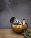 White sage incense and singing bowl Royalty Free Stock Photo